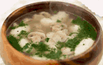 Грибной суп с зеленью и рисом.